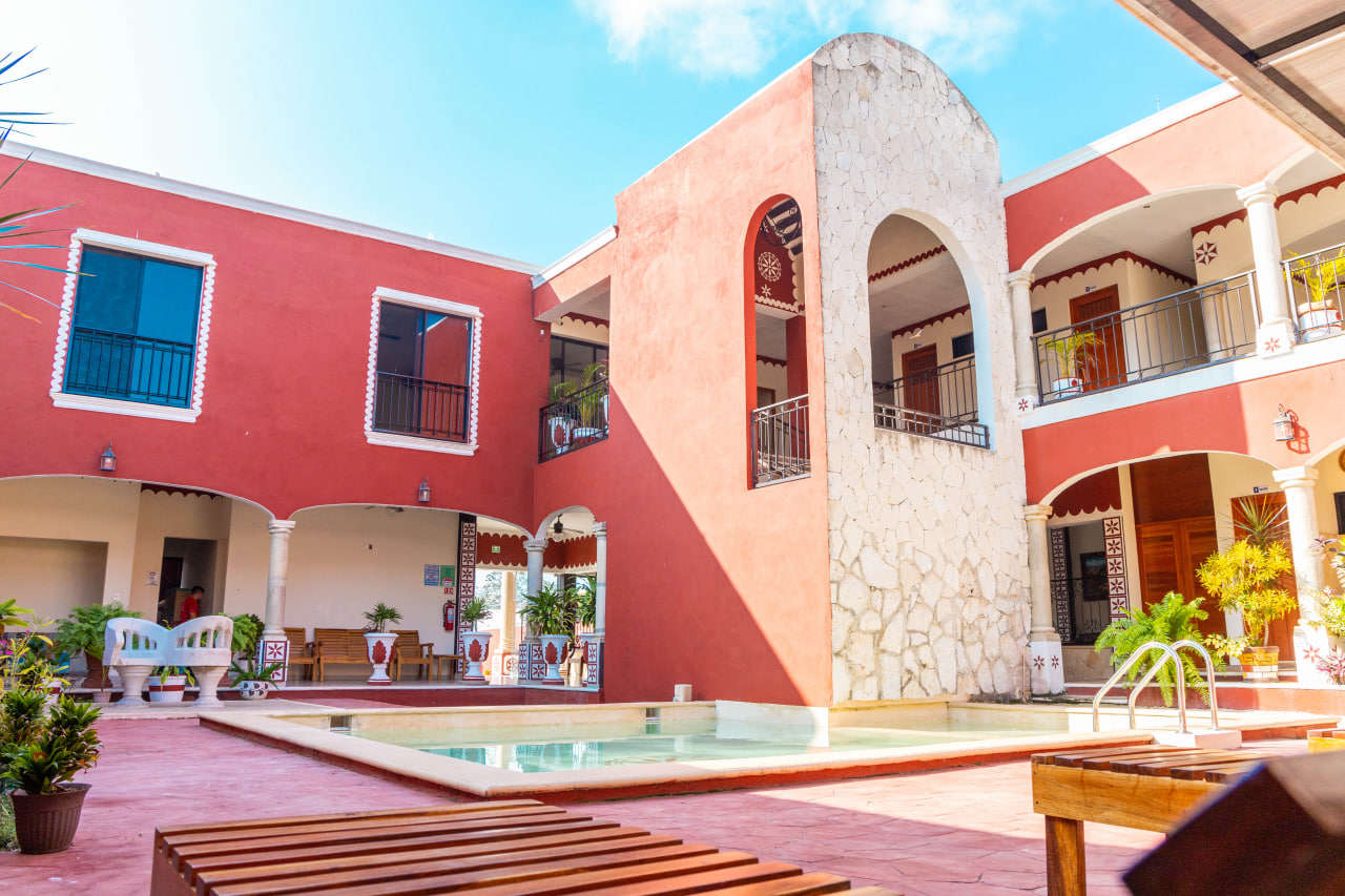 A serene courtyard of a hacienda-style hotel.